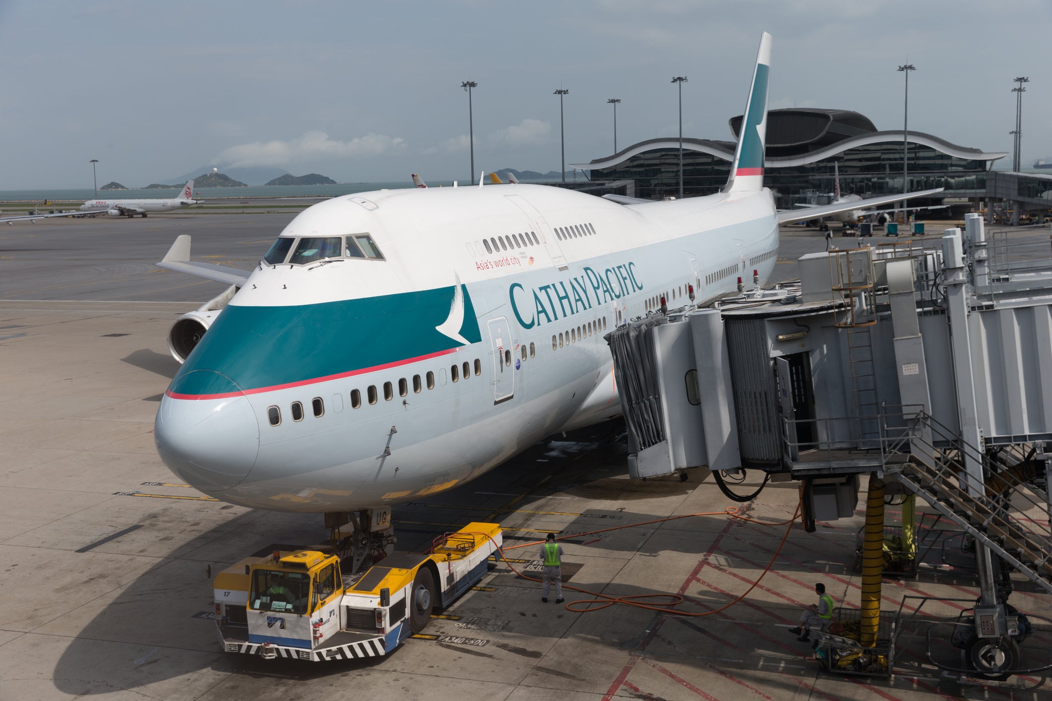 A Cathay Pacific Airways plane at Hong Kong International Airport. A flight attendant was forced to hold a bathroom door during a 16-hour flight from Hong Kong to New York City this week