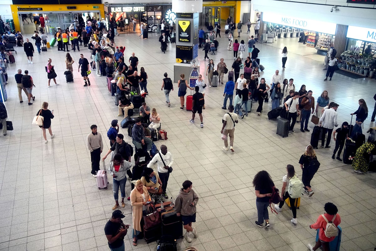 Huge queues snake though Gatwick as global IT outage disrupts flights | News