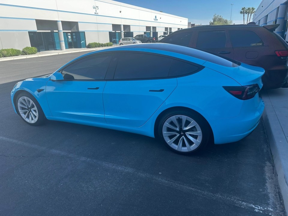 blue wrapped tesla