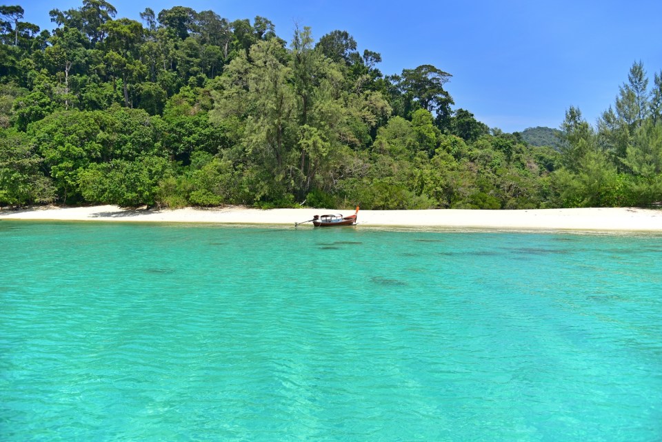 A long tail boat at Adang island (Koh Adang) at Satun, Thailand.