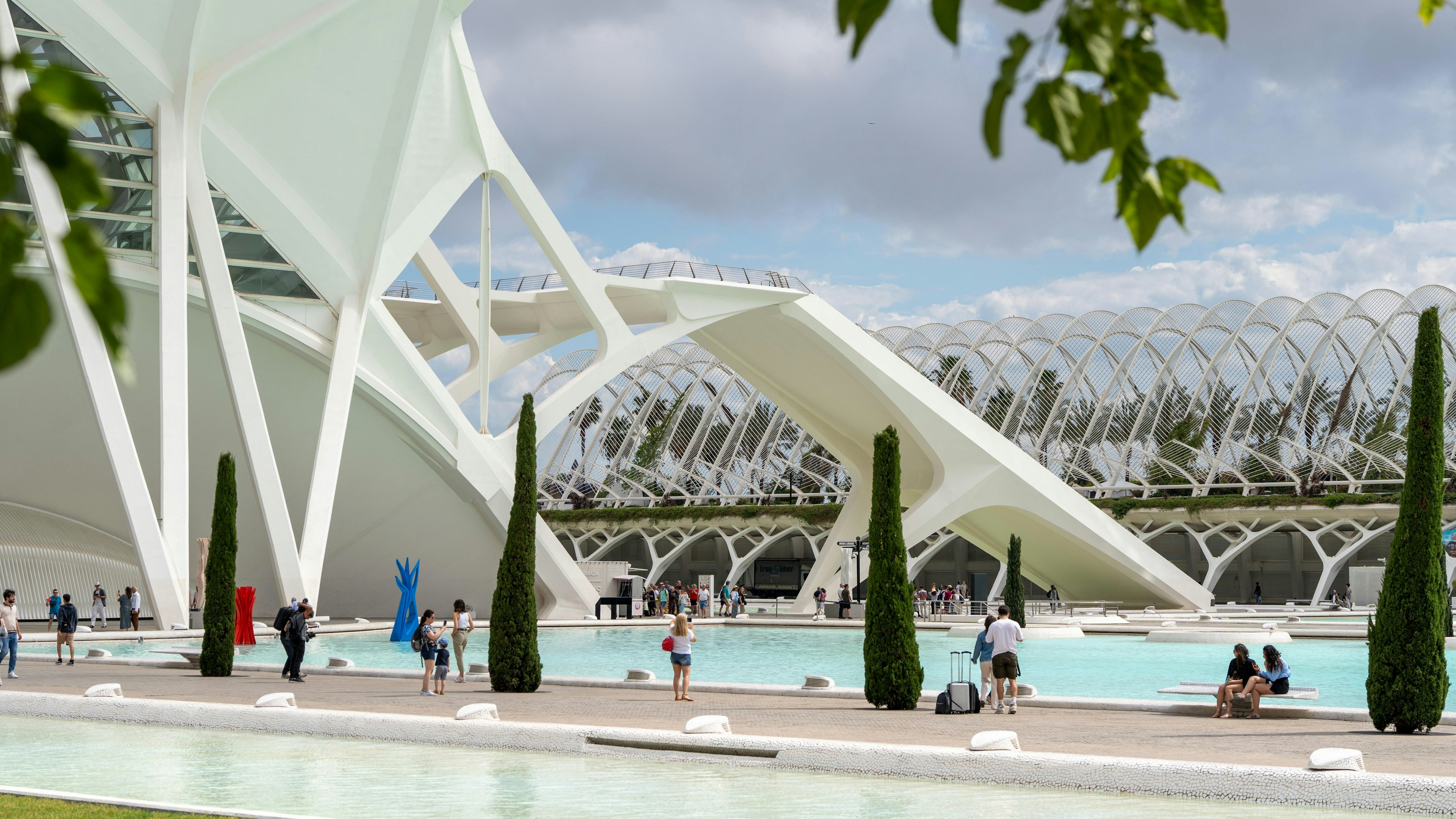 A man-made pond surrounds's the park's science museum.