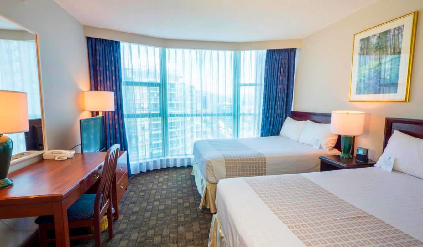 A bright and spacious hotel room in the Rosedale on Robson Suite Hotel in Vancouver, Canada