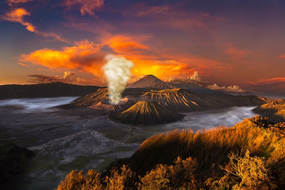 Sunrise at volcano Bromo, Java island, Indonesia. Panoramic aerial view