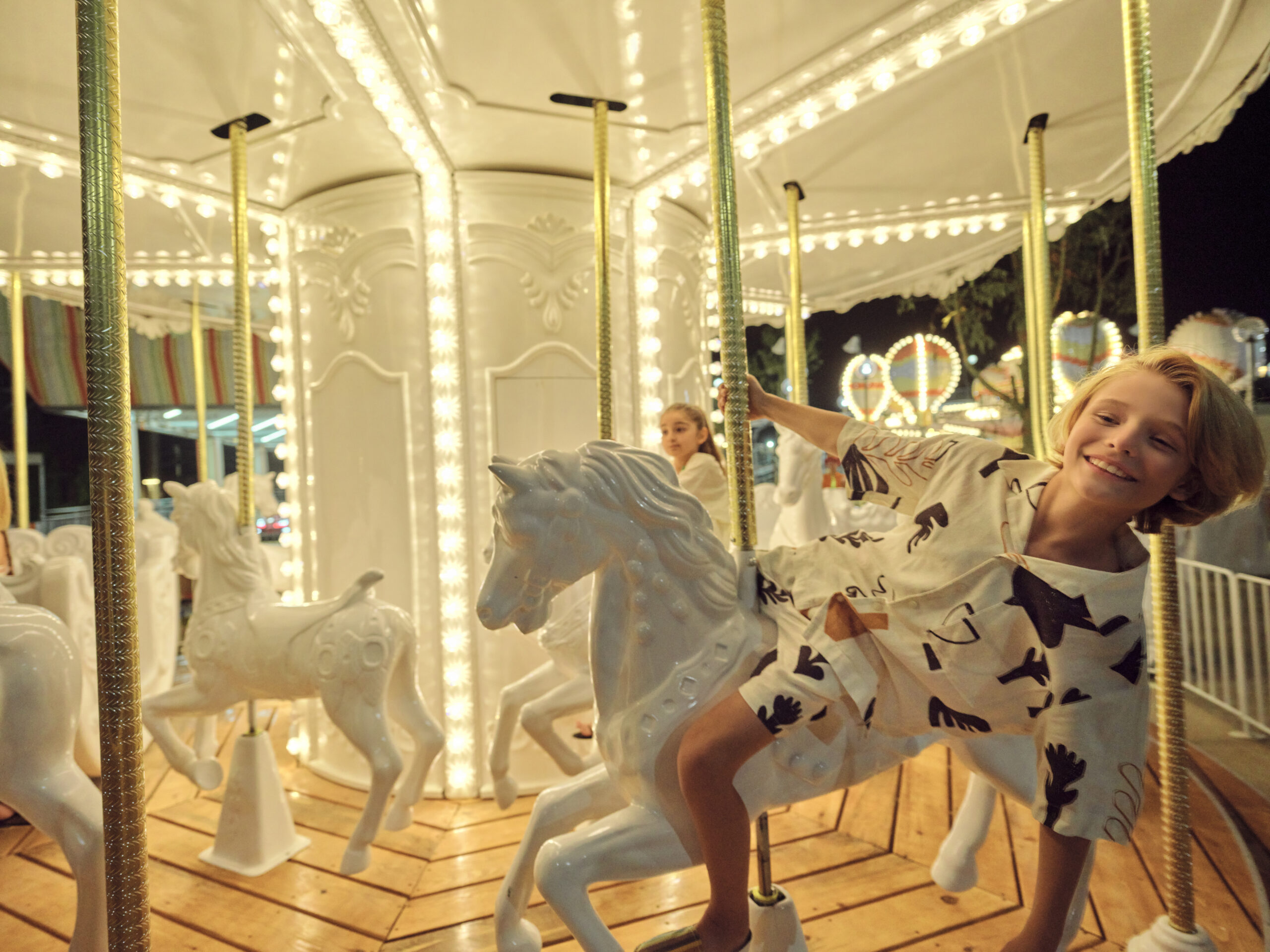 In the evening, a mini-carnival comes to life