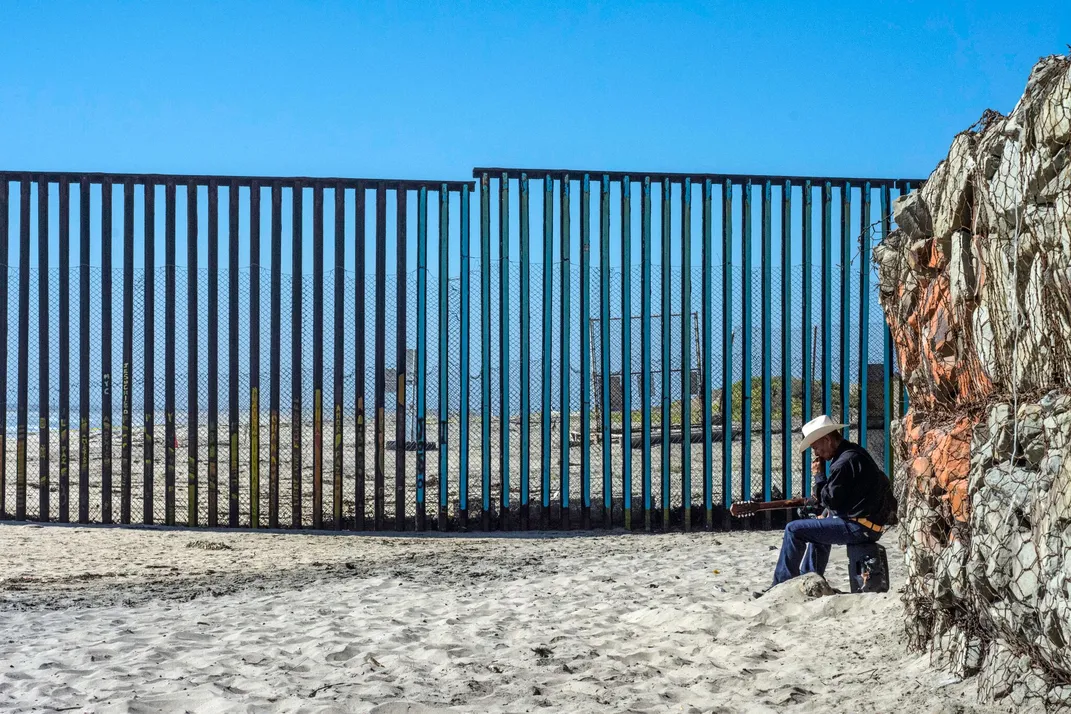 A vaquero (Mexican cowboy) is seemingly in deep in thought near the United States-Mexico Border in Tijuana.