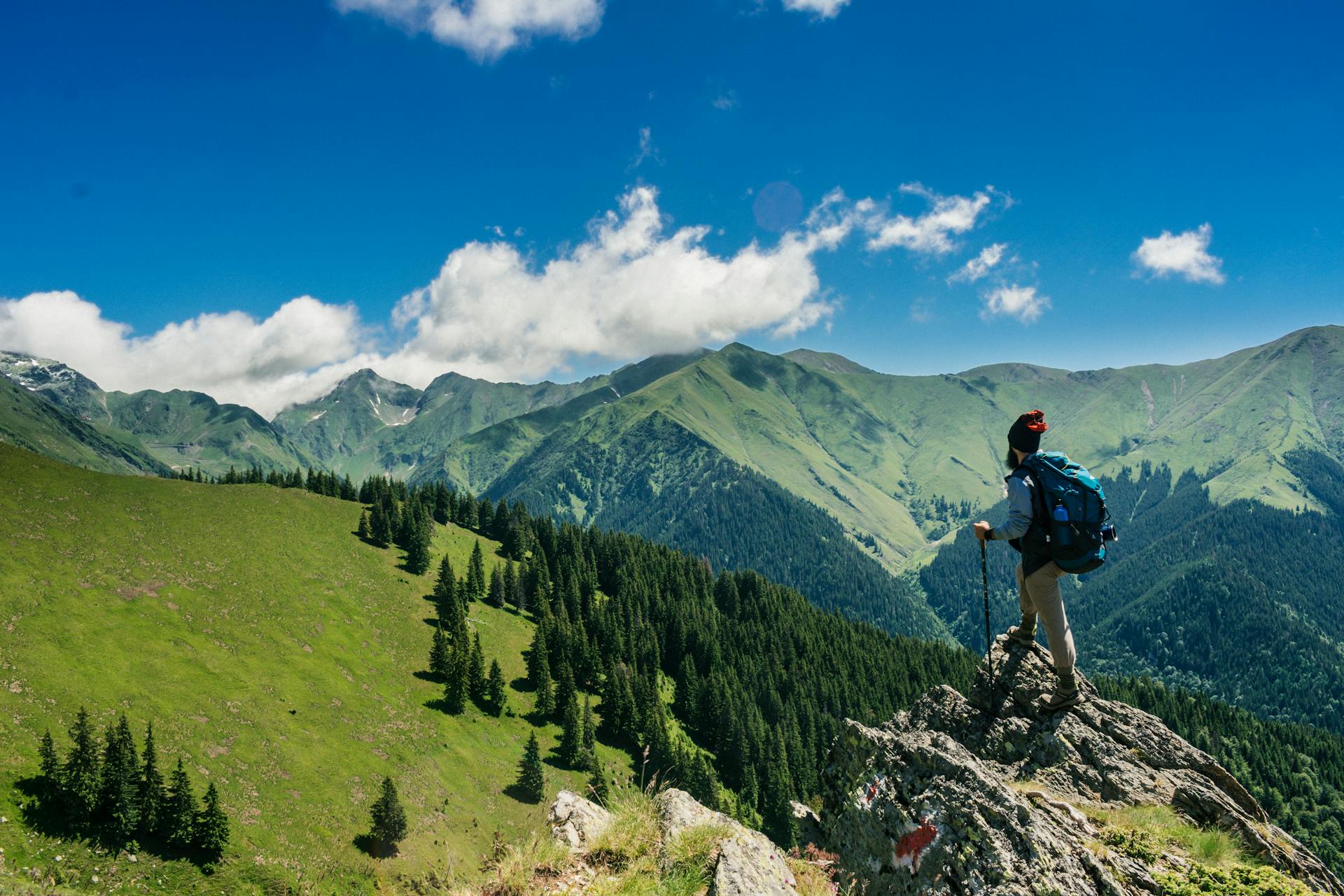 A hiker traveling through the mountains in Romania (photo: Andrei Tanase).