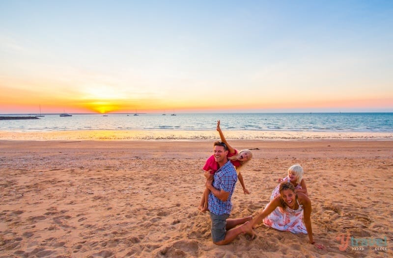 family posing on Cullen Bay Beach