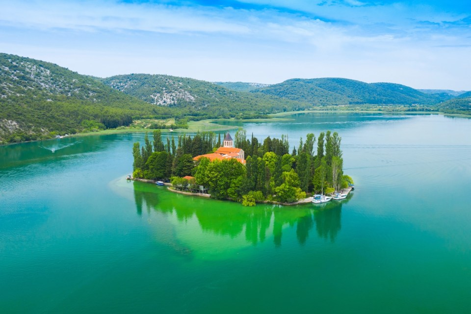 Beautiful island of Visovac on lake in Krka national park, Dalmatia, Croatia