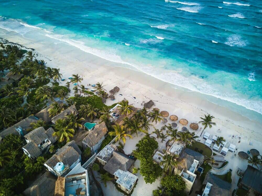 aerial view of beach clubs on tulum beach