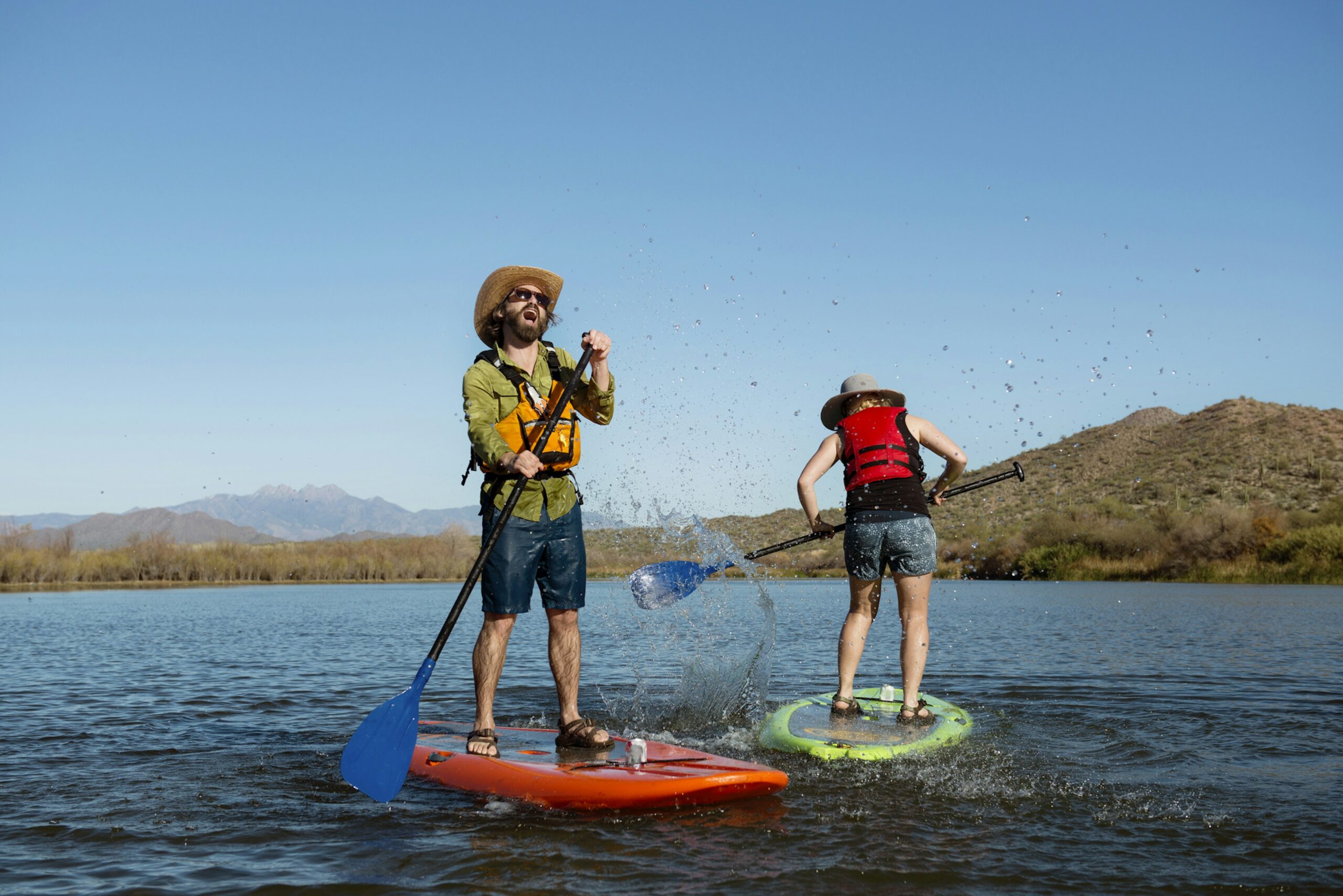 Two men on paddleboards in the USA, Arizona, Phoenix