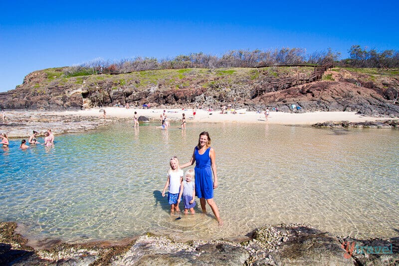 mother and kids standing in Champagne Pools