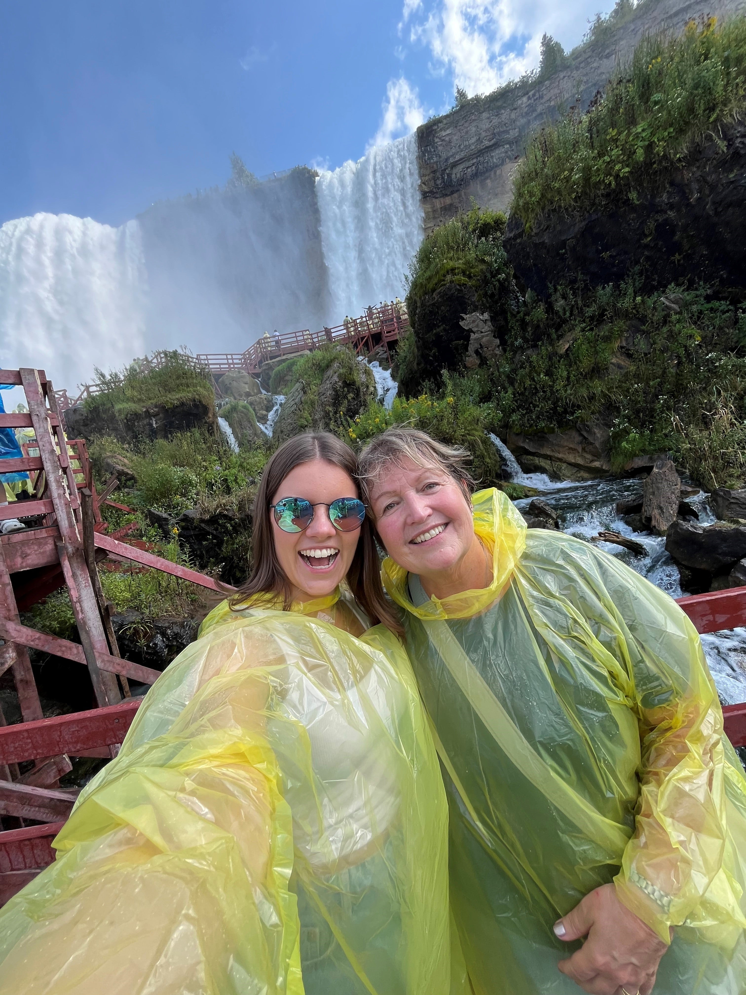 Hannah, right, and Grace in their rain ponchos at Cave of the Winds