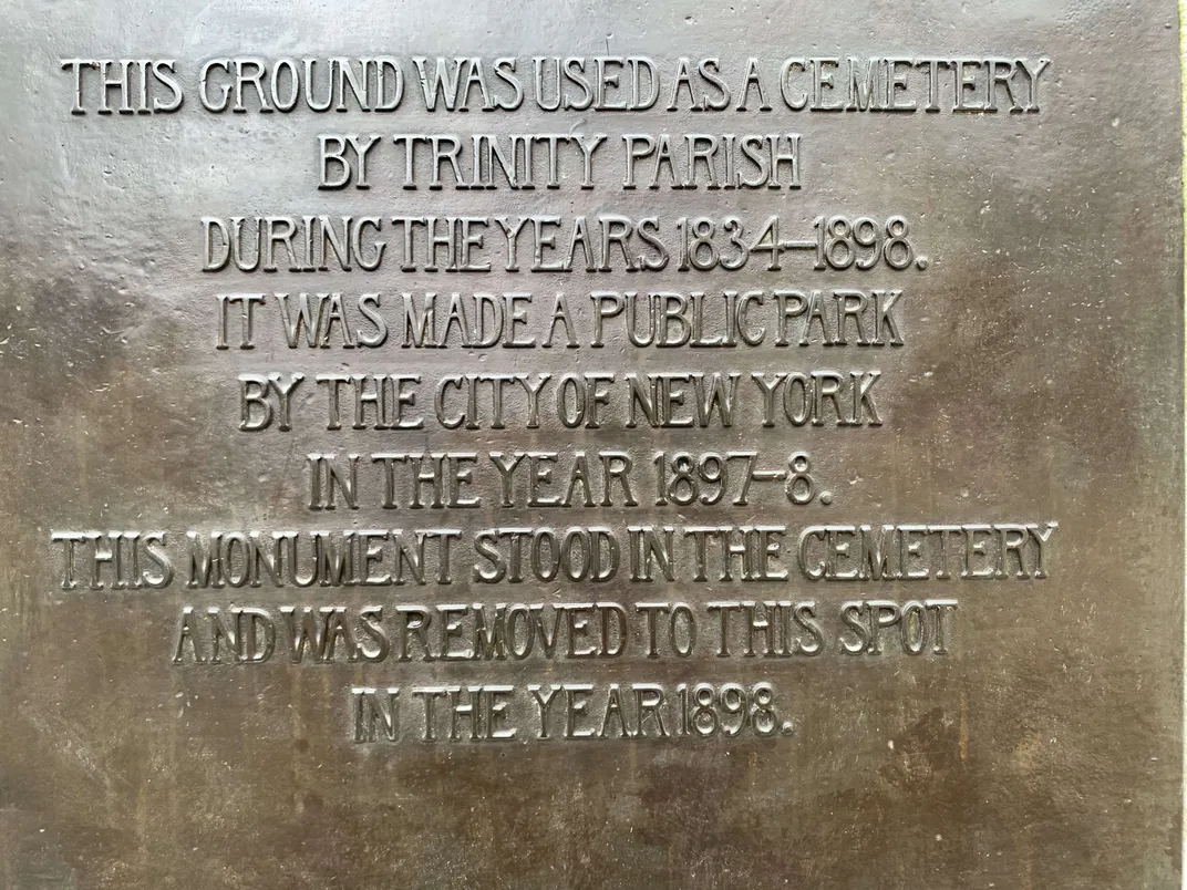 plaque on white stone monument at James J. Walker Park's northern entrance