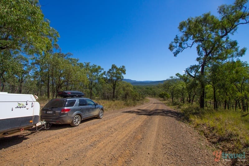 car and caravan on dirt road in Carnarvon Gorge National Park, Queensland, Australia