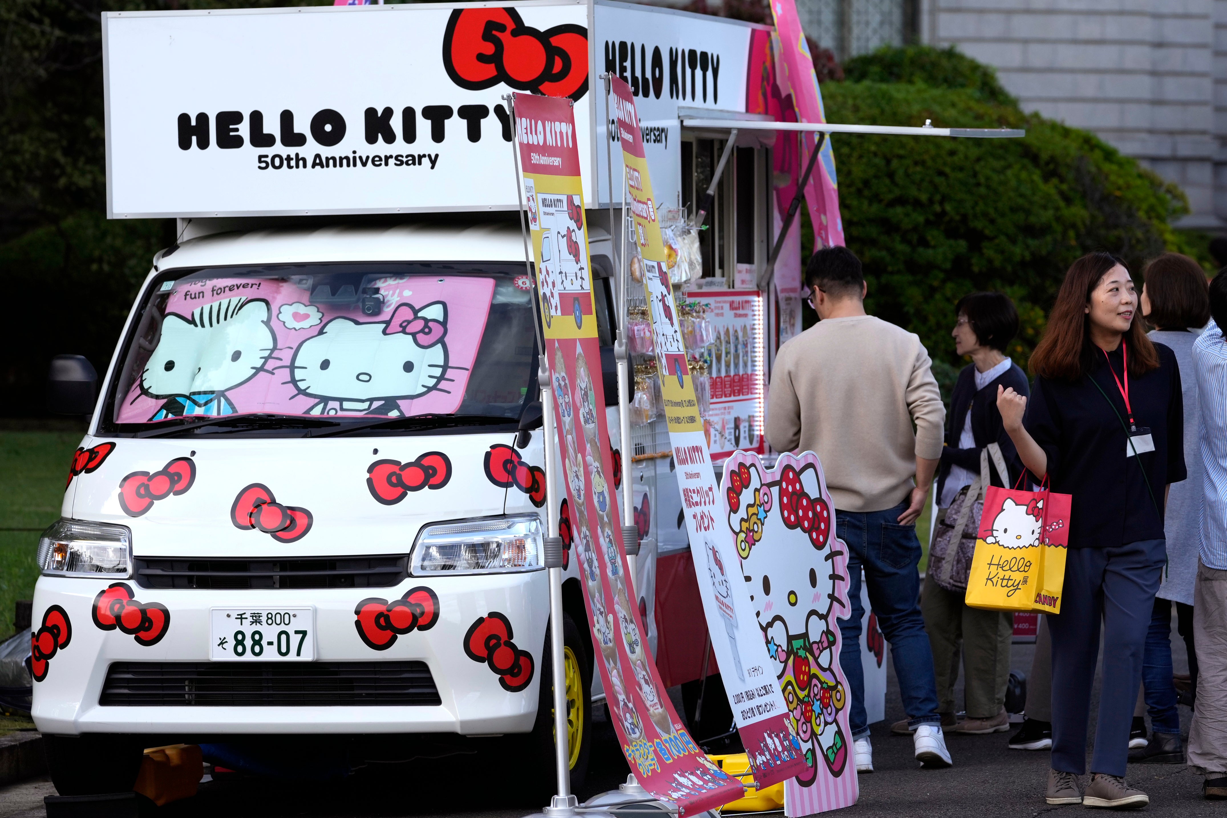 A food vendor’s van is decorated with Hello Kitty images outside the National Museum