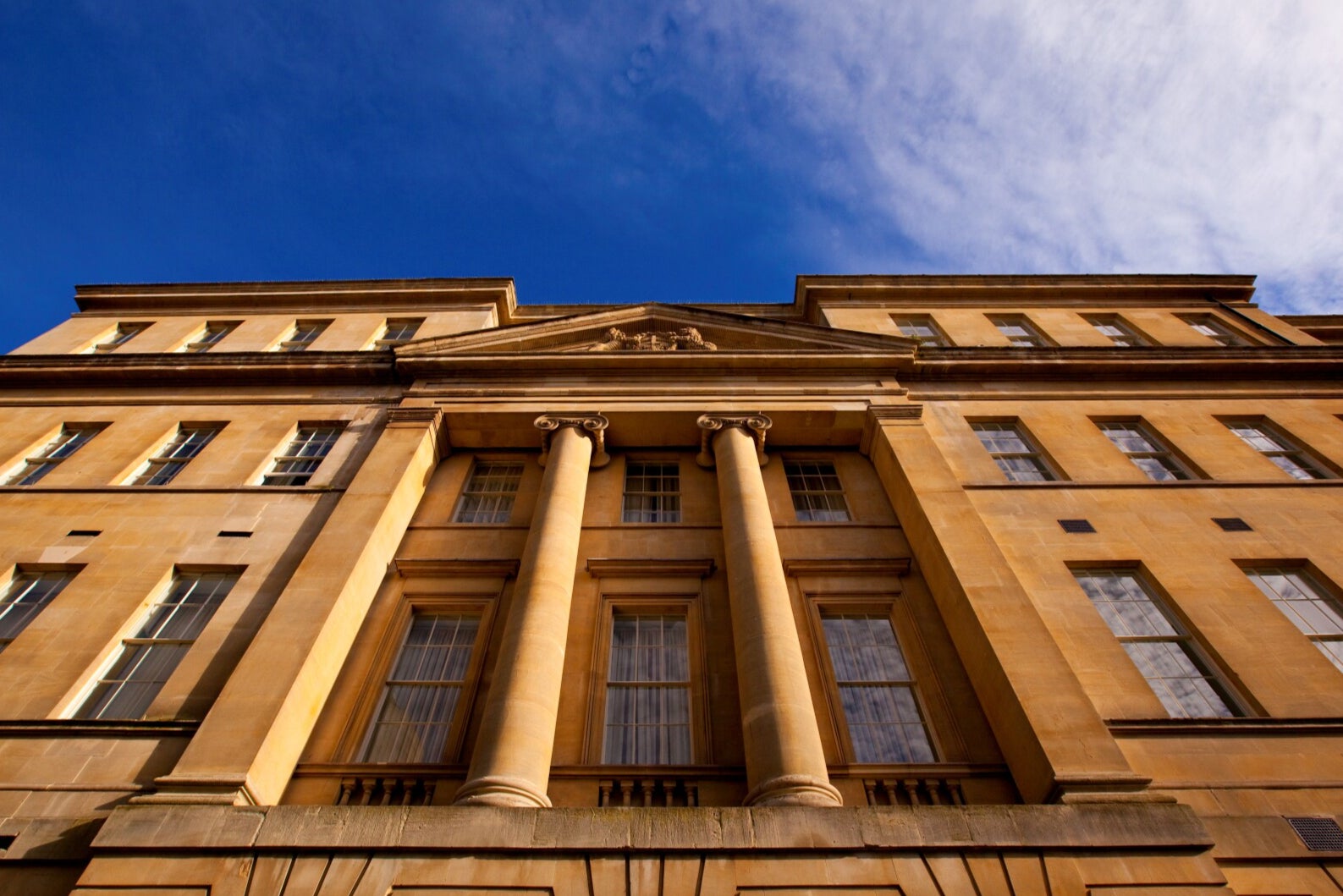 The hotel’s honey-tinted exterior