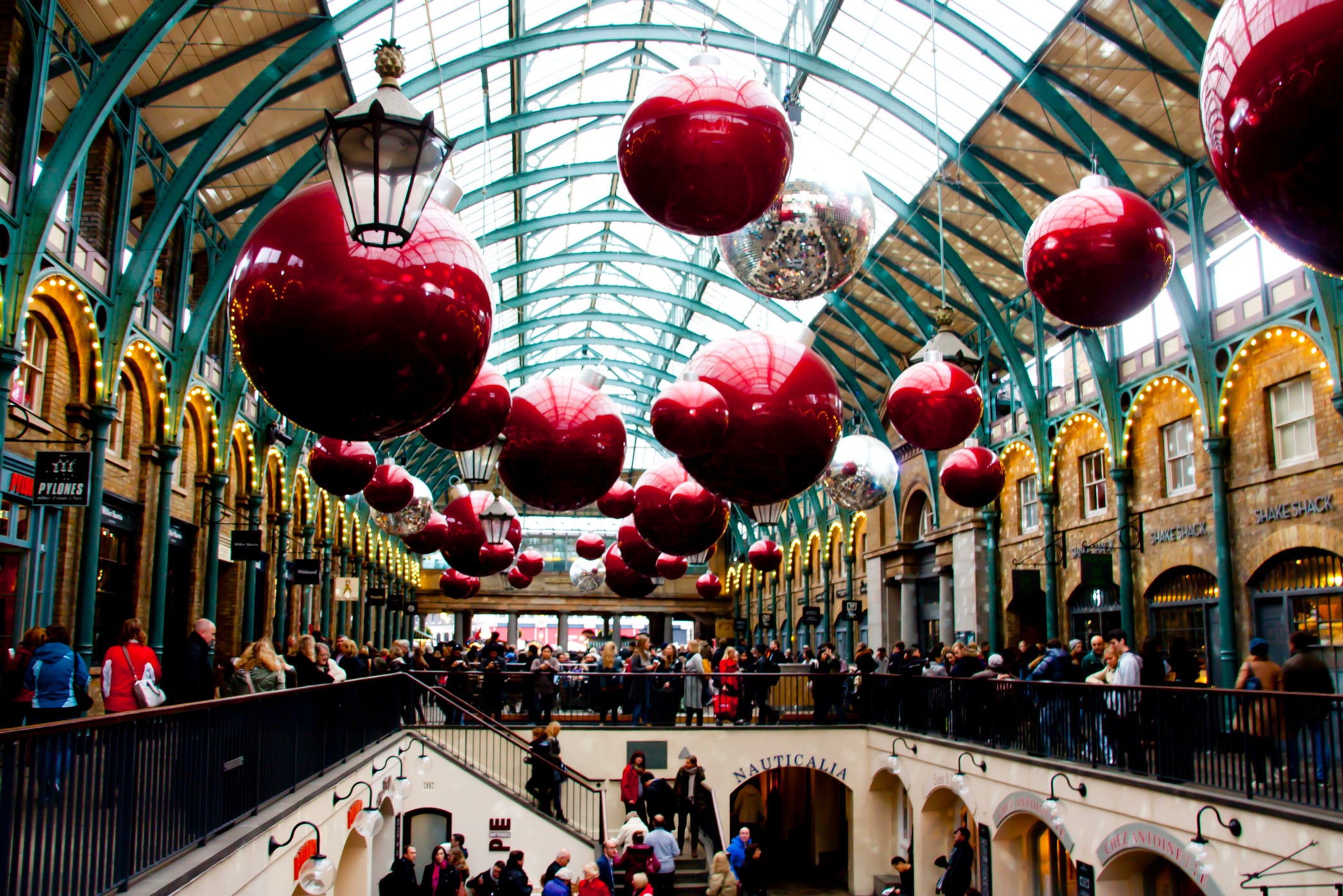 Covent Garden hosts a Christmas market each year, often decorated by giant baubles or gigantic bells with bows