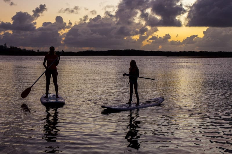 family Stand up paddle boarding with kids