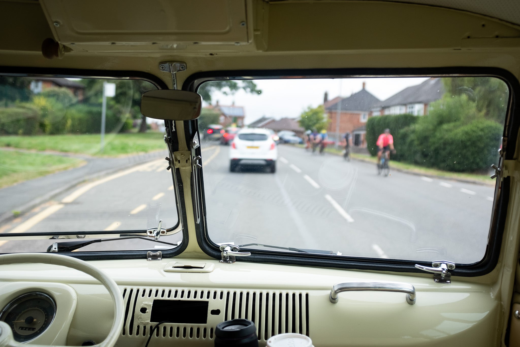 Nico hitchhiking in a VW van in the Midlands, August 2024