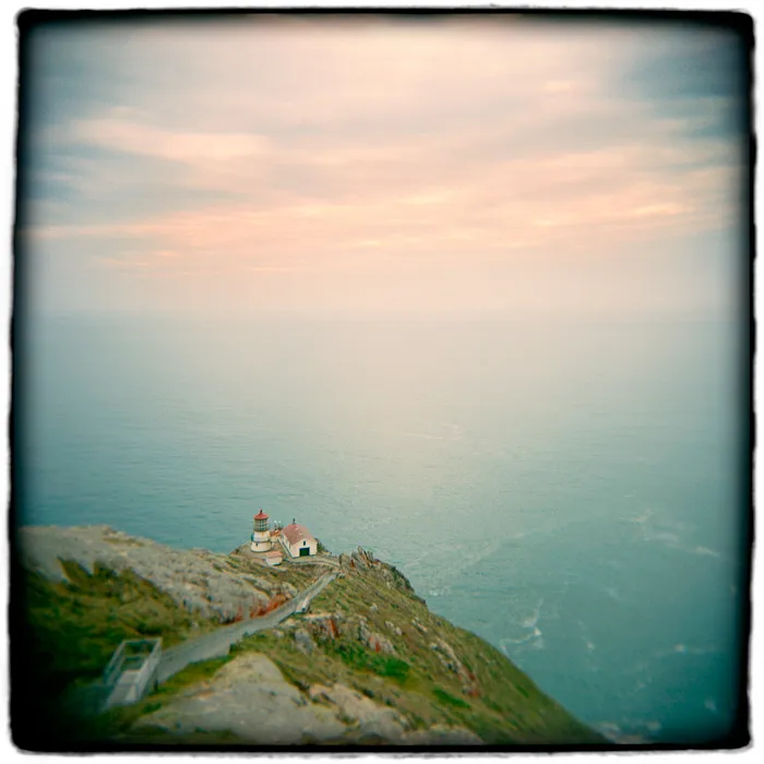 Aerial view of a lighthouse on a cliff