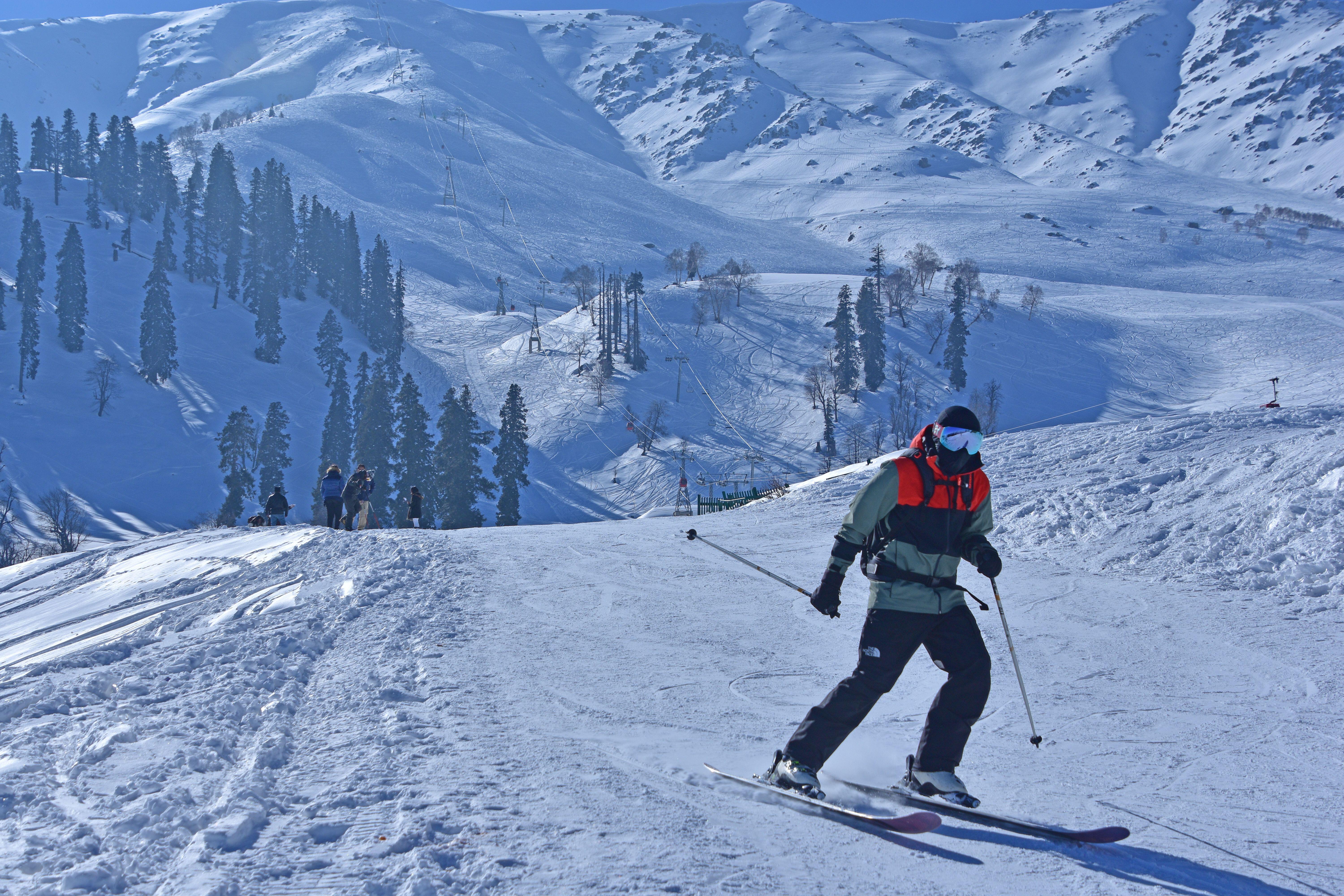 Skiing in the slopes of Gulmarg in January 2021 (Alamy/PA)