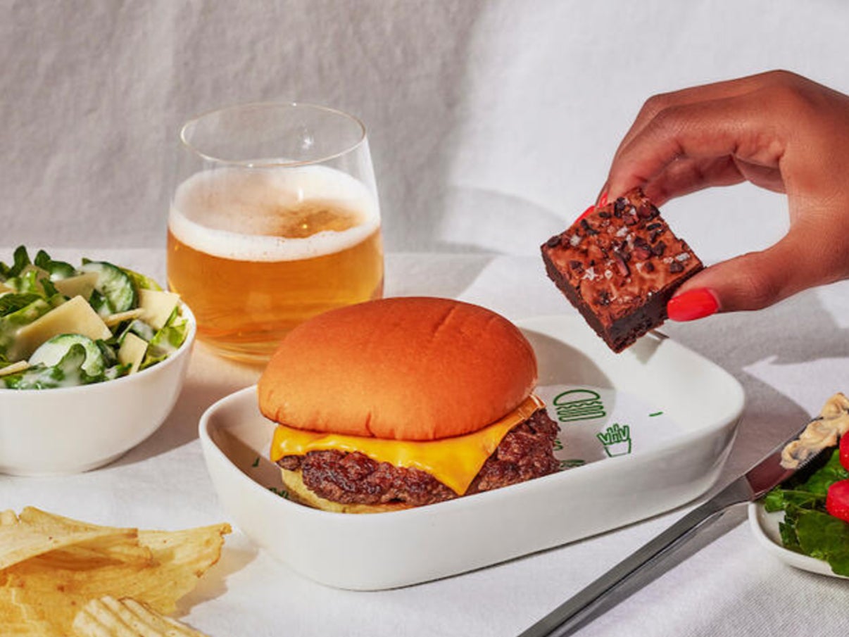 Delta Air Lines will now be offering Shake Shack cheeseburgers to certain First Class passengers