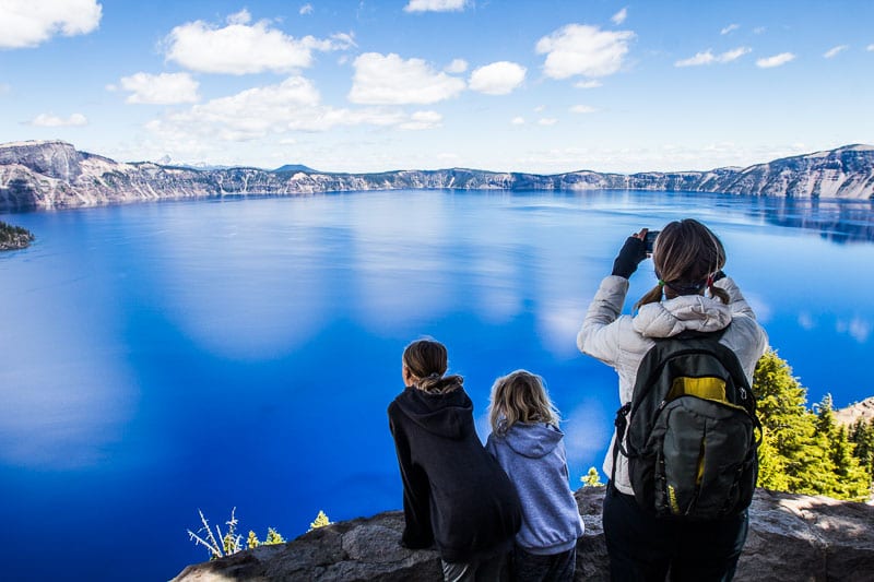 people looking out at crater lake