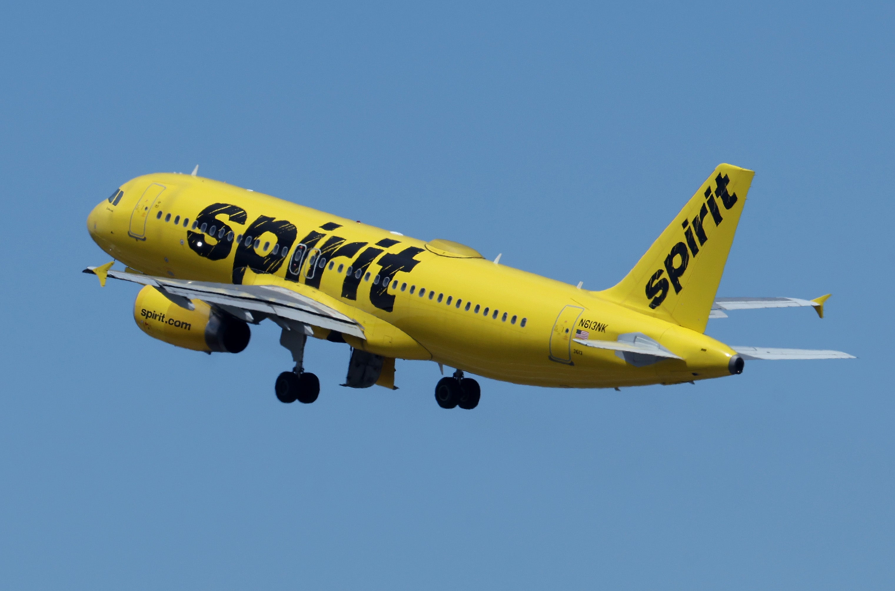 A Spirit Airlines flight pictured taking off. The FAA banned all US flights to Haiti for one month after gang gunfire struck a Spirit Airlines flight during its descent into Port-au-Prince on Monday