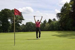 Golfer celebrating