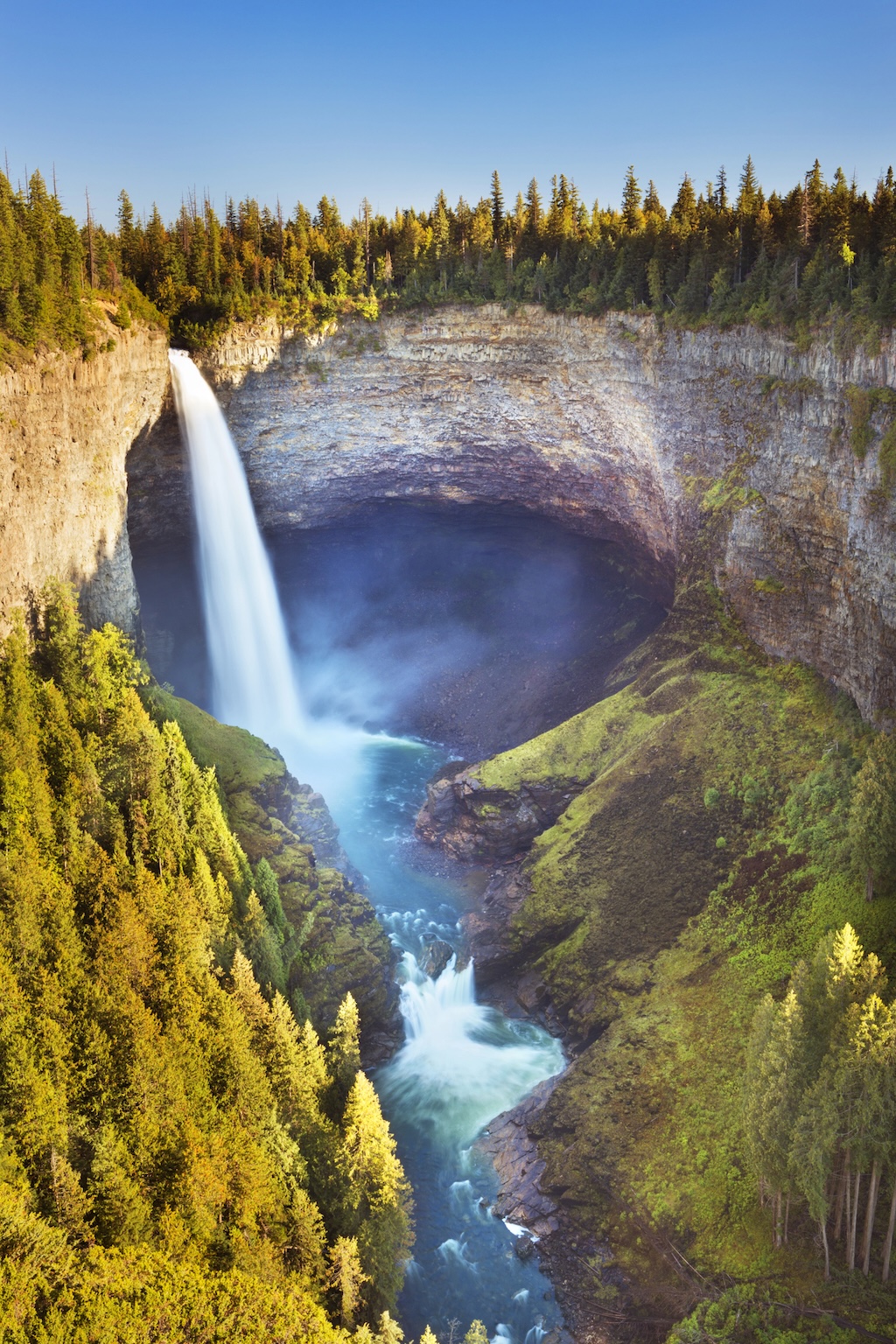 The Helmcken Falls in Wells Gray Provincial Park, British Columbia, Canada. Photographed on a bright and sunny day.