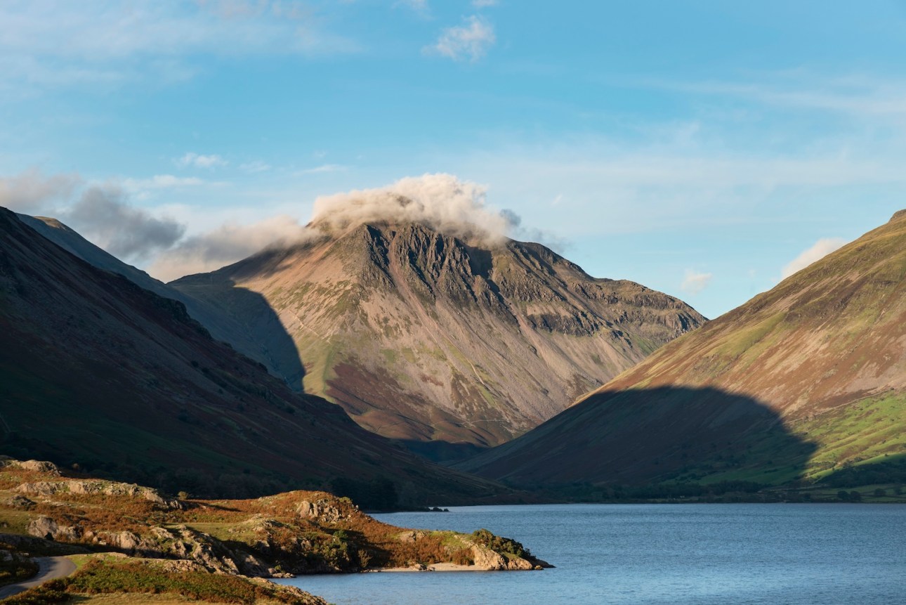 Stunning late Summer landscape image of Wasdale Valley in Lake District, looking towards Scafell Pike, Great Gable and Kirk Fell mountain range