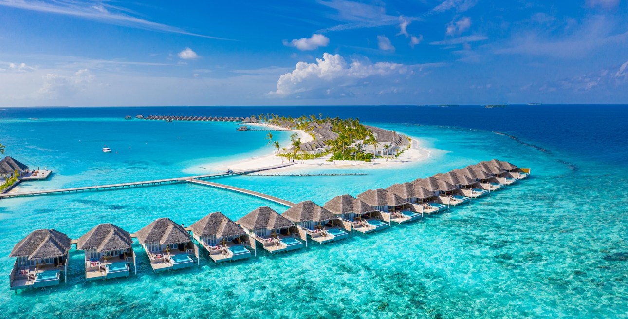 Aerial photo of beautiful Maldives paradise tropical beach