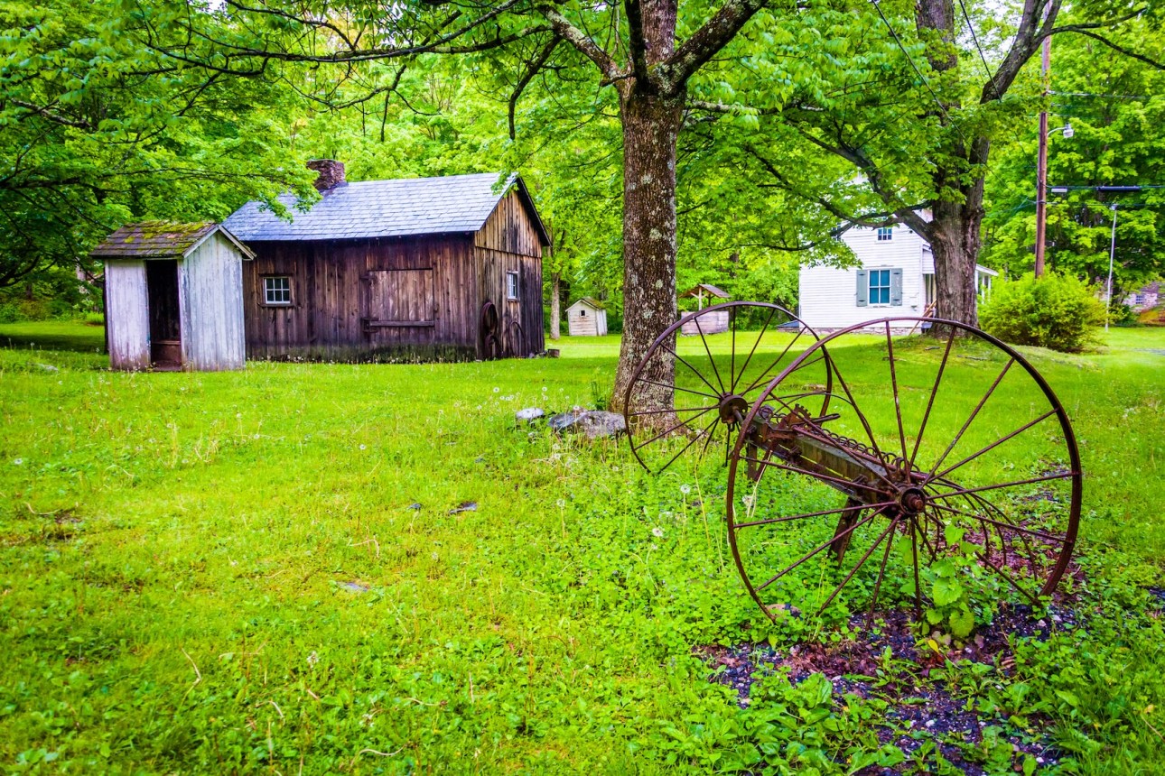 Old barn and farm equipment at  Millbrook Village, at Delaware Water Gap National Recreational Area, New Jersey.
