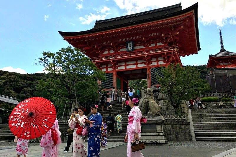 Japanese women outside temple