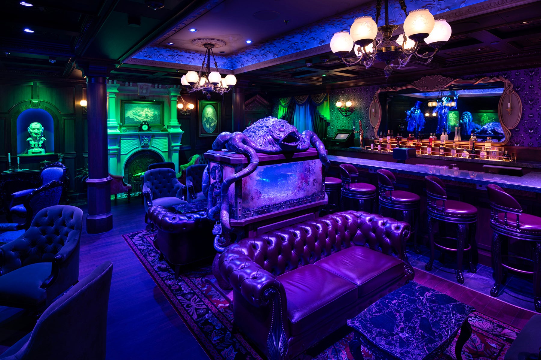 The interior of The Haunted Mansion Parlor on the Disney Treasure including the aquarium centrepiece (Disney/Kent Phillips/PA)