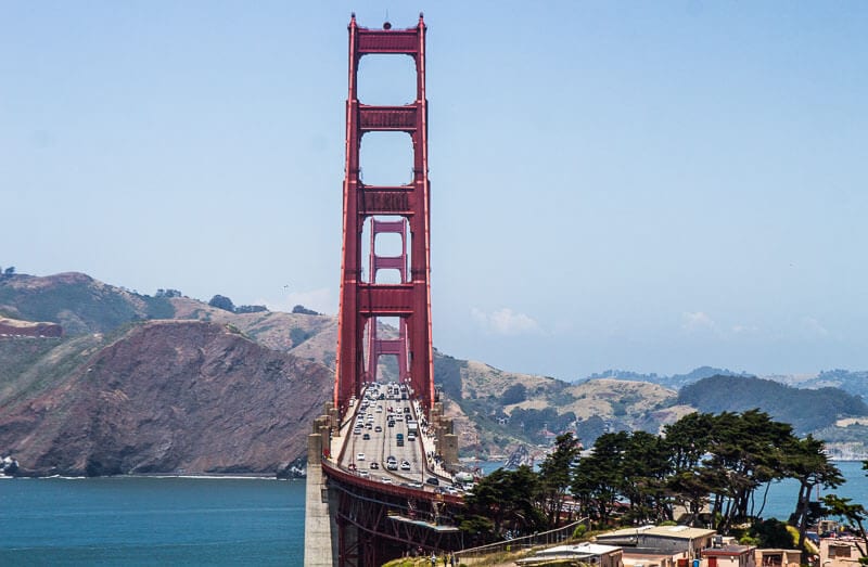cars going over golden gate bridge