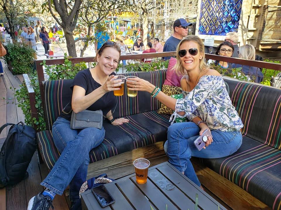 two females having a drink