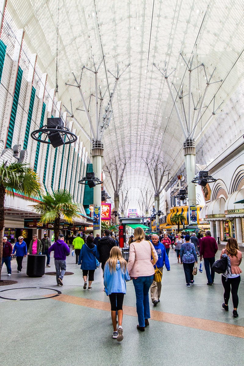 family walking down fremont st vegas