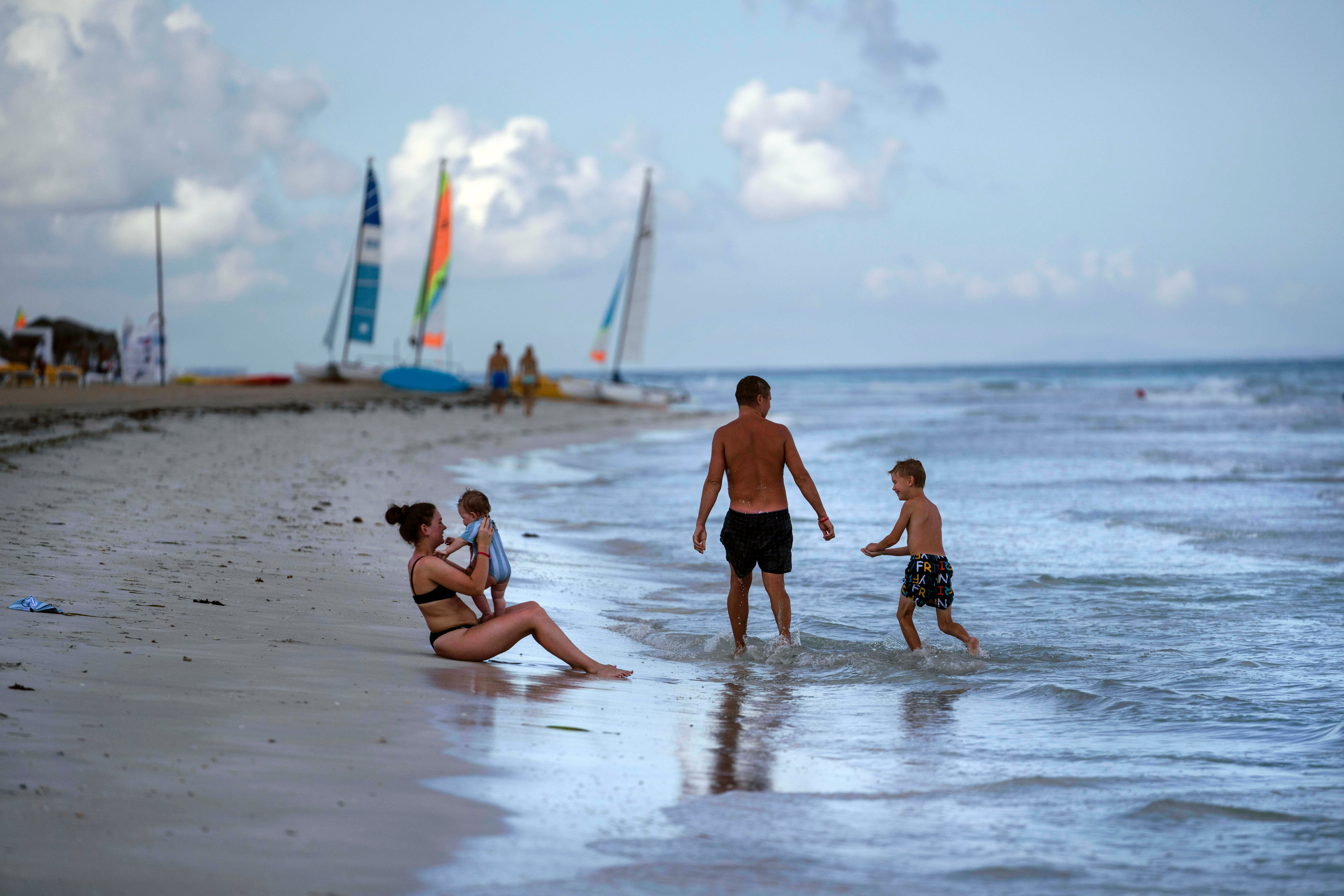Tourists are seen along the beach at the Iberostar Selection Varadero hotel in Varadero, Cuba