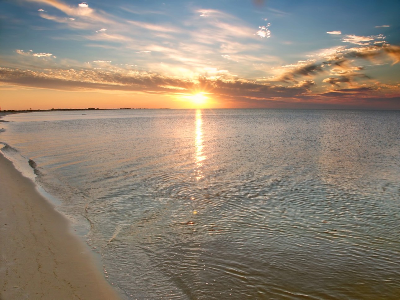 Ocean sunset from Horn Island of the Gulf Islands National Seashore in Mississippi.