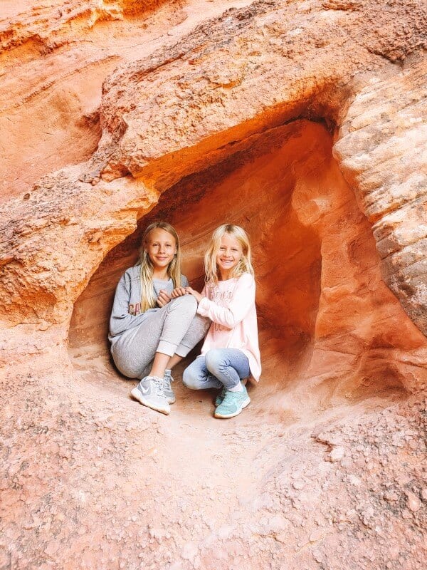 people sitting in a rock