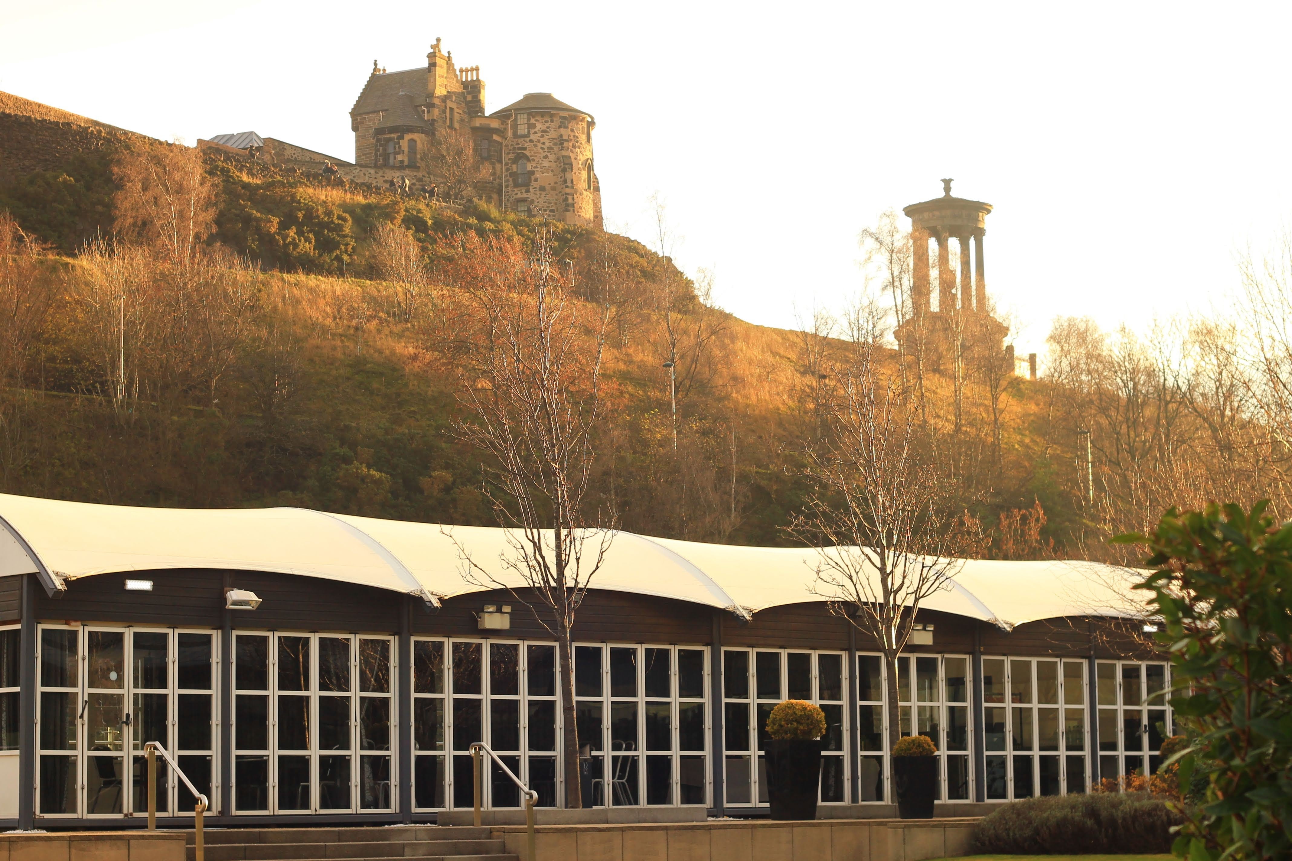 The Glasshouse sits at the foot of Calton Hill