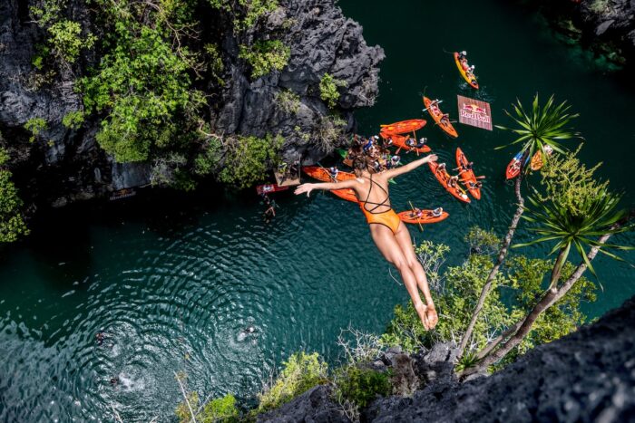 Nelli Chukanivska of the Ukraine dives from 20 metres off the pinnacle in the Small Lagoon during the second competition day of the first stop of the Red Bull Cliff Diving World Series in El Nido, Philippines on April 12, 2025. // Dean Treml / Red Bull Content Pool