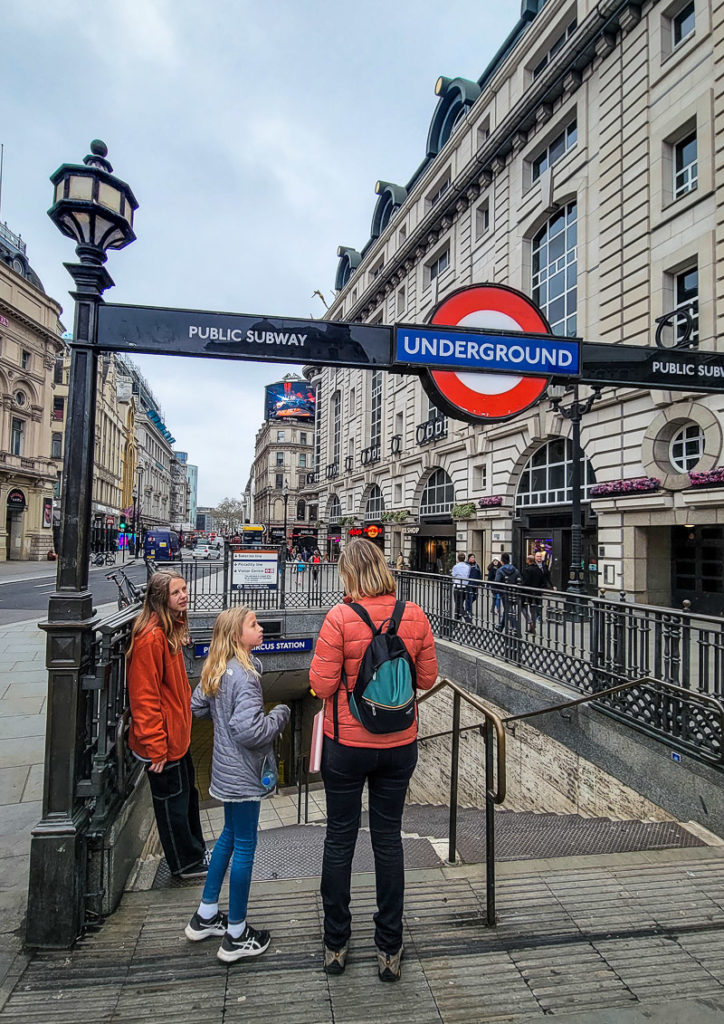 family at entrance to London Underground train (Tube)