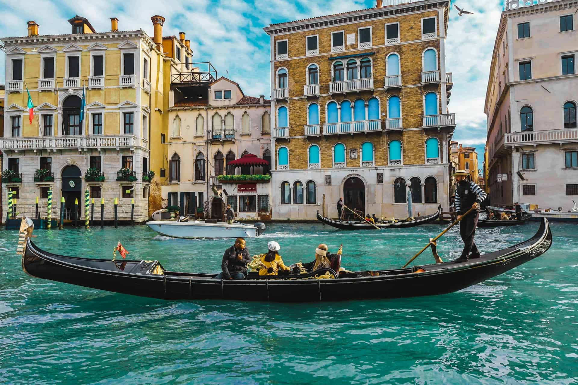 Gondola ride in Venice (photo by Adrian Krajcar, Unsplash).
