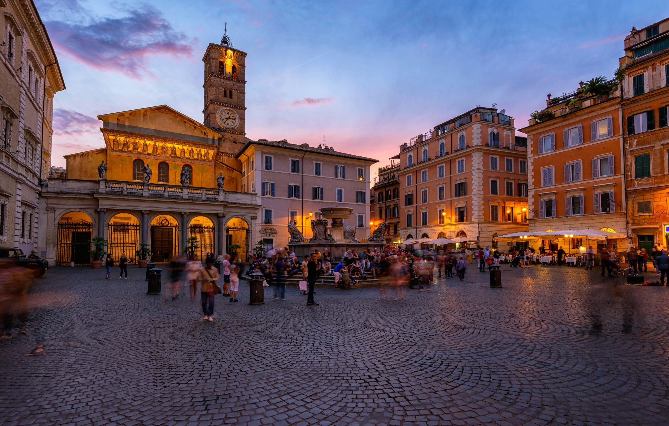Basilica di Santa Maria in Trastevere and Piazza di Santa Maria in Trastevere at sunset