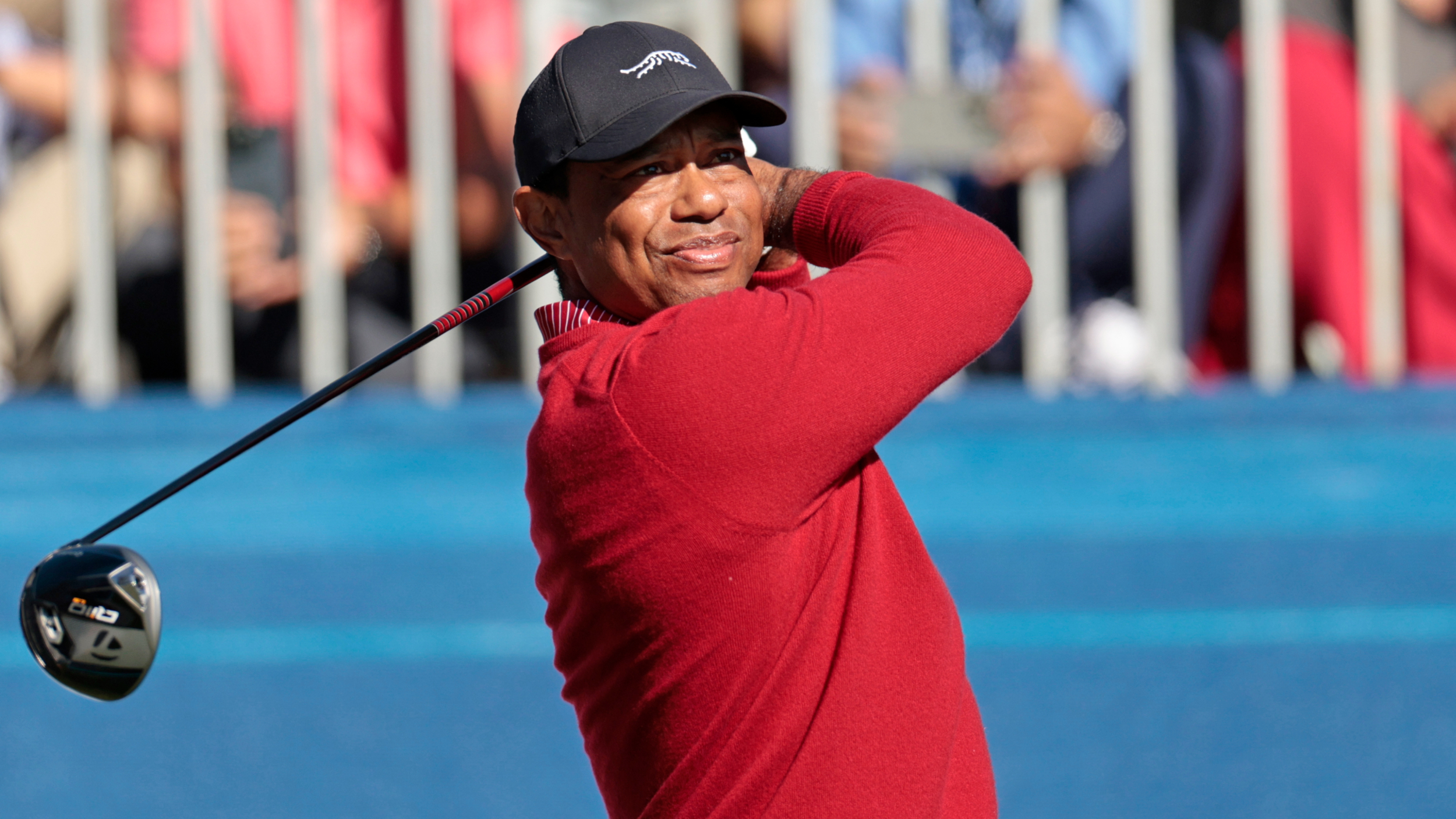 Tiger Woods takes a shot at the PNC Championship