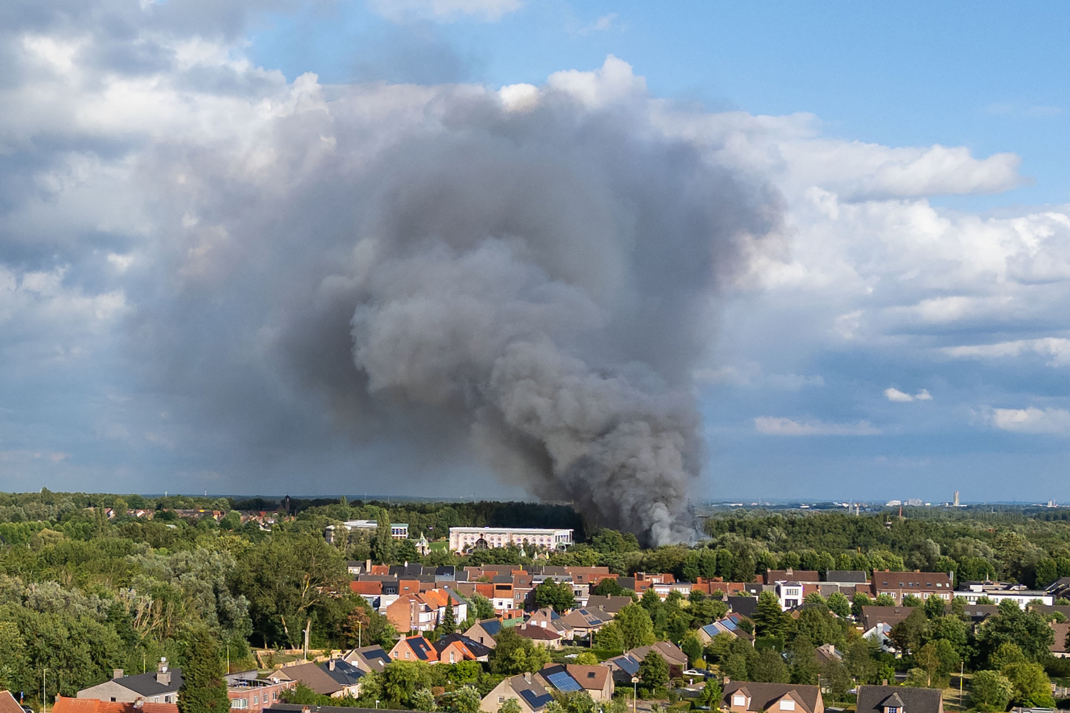 Images shared on local news sites and social media showed flames and plumes of black smoke engulfing the stage and spreading to nearby woodland on Wednesday