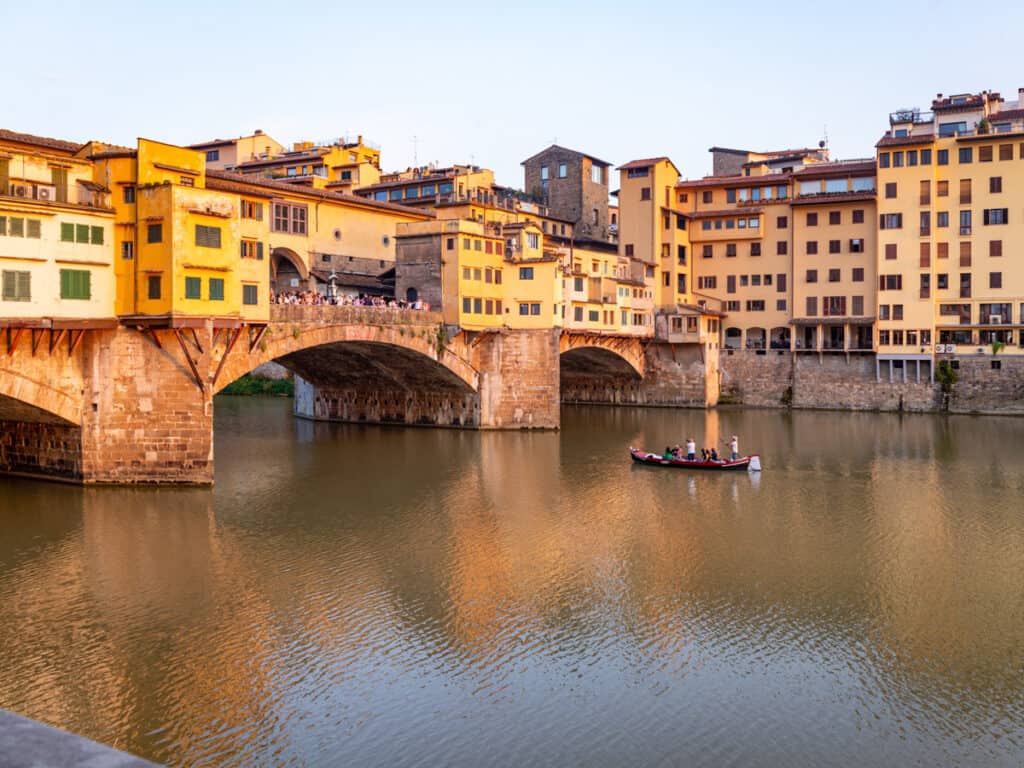 golden light on ponte vecchio bridge