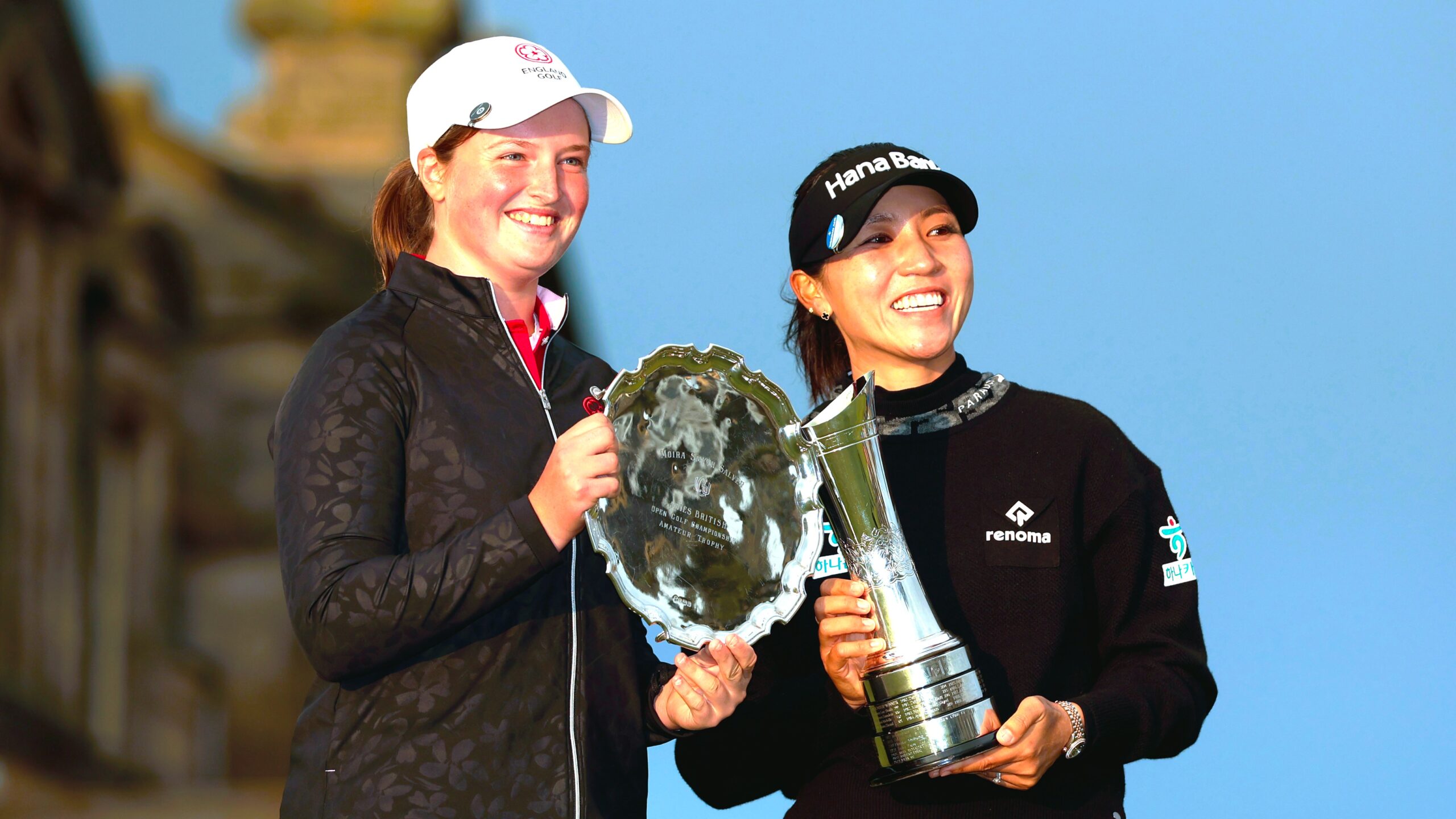Last year’s Leading Amateur, Lottie Woad, and AIG Women’s Open Champion, Lydia Ko with the Smyth Salver and AIG Women's Open trophy after the trophy presentation at St Andrews
